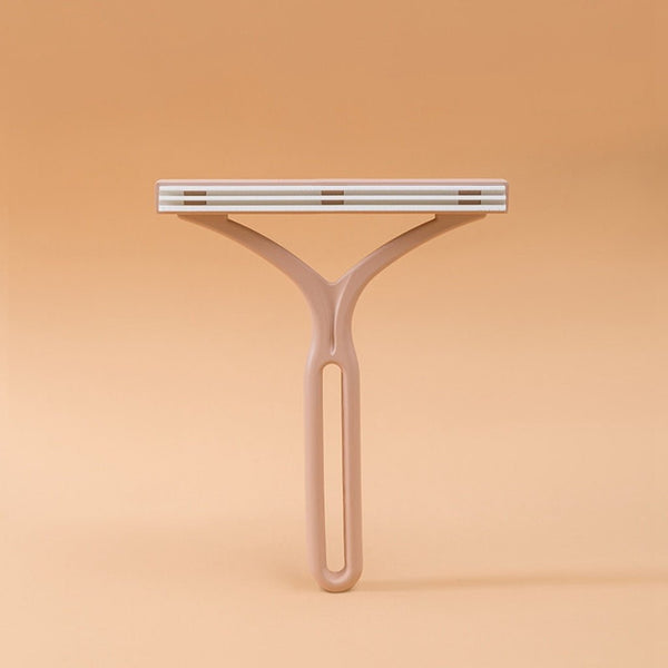 Double-ended manual lint eliminator - TumTum