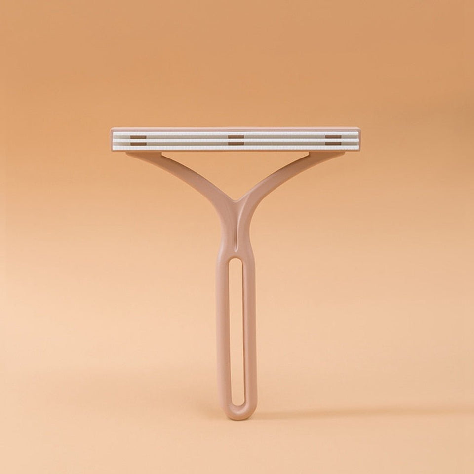Double-ended manual lint eliminator - TumTum
